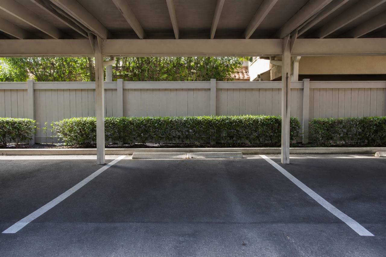 Covered parking stall